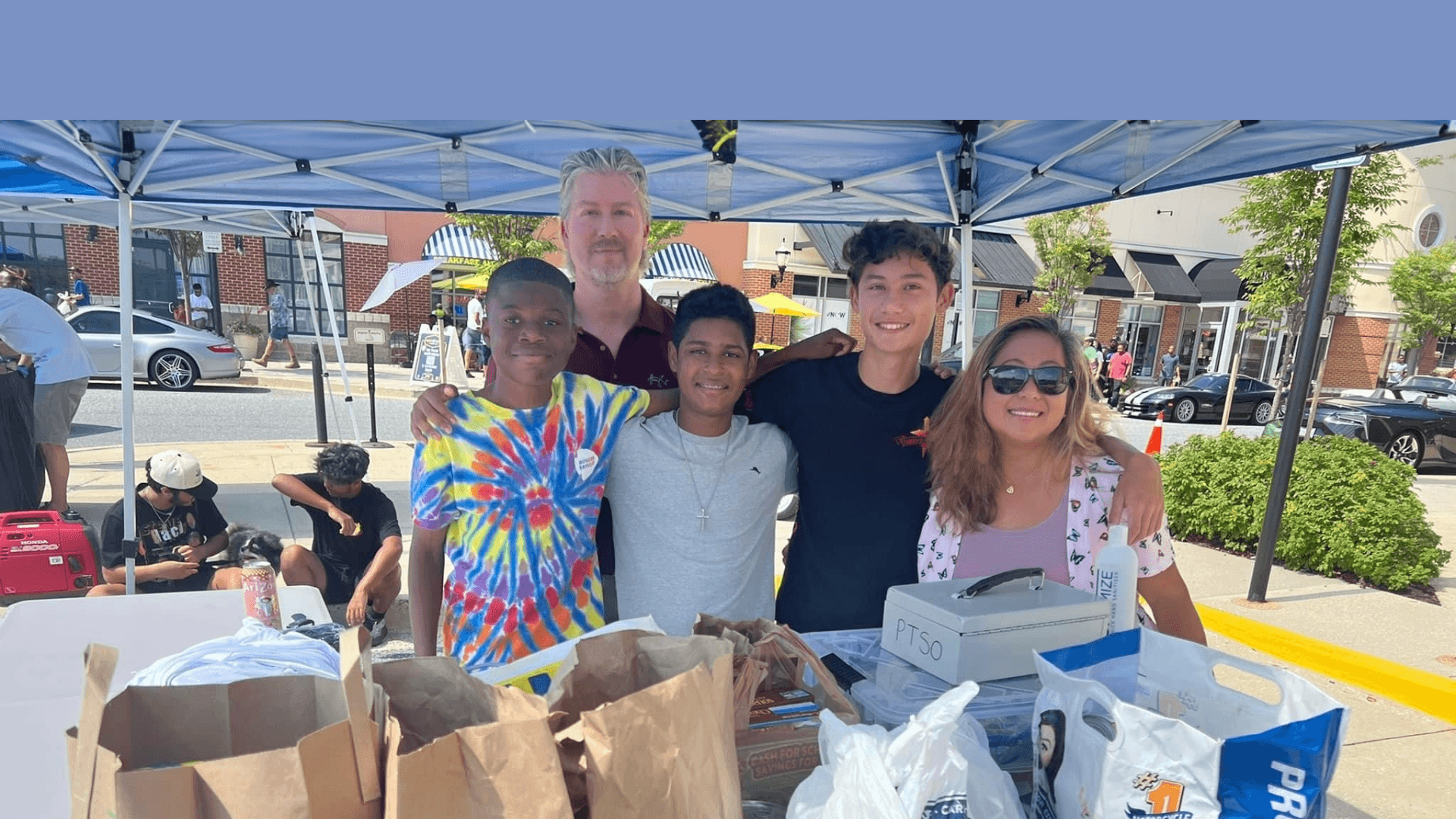 Volunteers distributing food to families in need